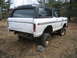 1979 Ford Bronco - This 1979 Ford Bronco is shown from a 3/4 front angle, a black hardtop and off-road tires.