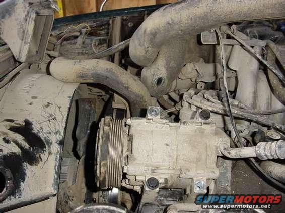 acdrilled.jpg sc pump holes need to be drilled out a tad bigger.  Van AC bolts needed to be used.