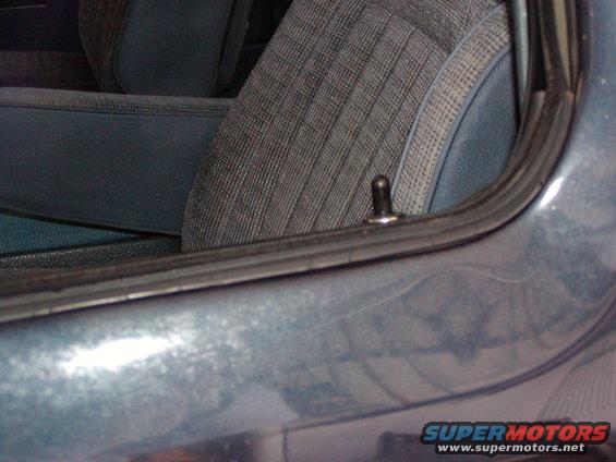 Interior door lock pin and window seal detail