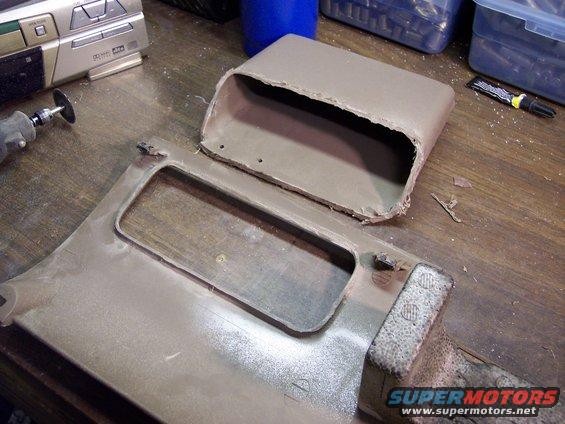 switch-panel-1.jpg First, I cut off the cubby hole pocket using my trusty Dremel tool.  And yes, those are boxes of fired pistol cartridge cases on my bench (I'm a reloader).