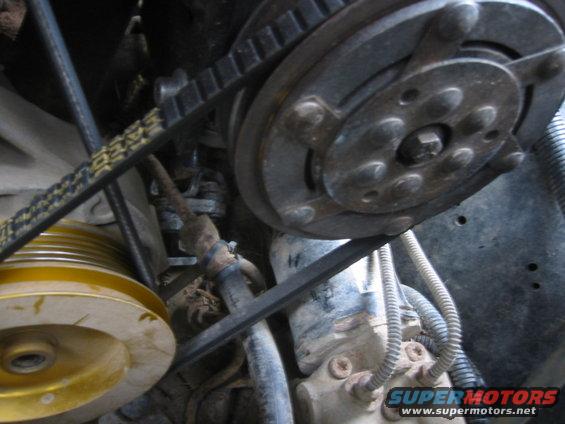 york-mount-3.jpg very tight clearance for the belt if the belt isn't tight (like the first time i bolted everything together) it will rub the power steering line when the engine twists in the mounts. but i slotted the holes a bit more and now it's fine