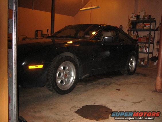 Black 1988 Porsche 944 parked in a garage
