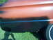 1963 Ford Ranchero - Rear quarter panel detail of a 1963 Ford Ranchero, showing its two-tone paint scheme and a portion of the white-wall tire.