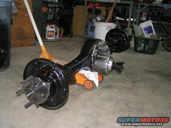 Rear axle assembly on an orange jack