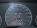 2000 Ford Crown Victoria - The odometer displays 65,290 miles on this vehicle's dashboard.