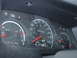 2000 Ford Crown Victoria - Close-up of a vehicle's interior dashboard gauges, including the speedometer, fuel, volts, temperature, and oil indicators.