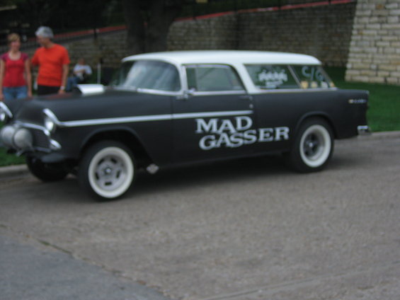 Black and white custom station wagon with "MAD GASSER" text on the side