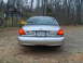 2004 Ford Crown Victoria - This 2004 Ford Crown Victoria is seen from the rear, displaying its Virginia license plate.