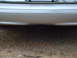 2004 Ford Crown Victoria - Rear view of a 2004 Ford Crown Victoria showing the bumper and a trailer hitch receiver.