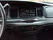 2004 Ford Crown Victoria - The interior dashboard of a 2004 Ford Crown Victoria, the radio and climate control system.