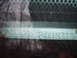 2004 Ford Crown Victoria - Close-up of a vehicle's VIN plate showing the identification number.