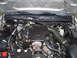 2004 Ford Crown Victoria - Engine bay of a 2004 Ford Crown Victoria, showing the V8 engine and associated components.
