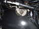 2004 Ford Crown Victoria - Close-up view of engine bay components, including hoses and wiring harnesses.
