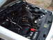 2004 Ford Crown Victoria - The engine bay of a 2004 Ford Crown Victoria is shown with the hood open.