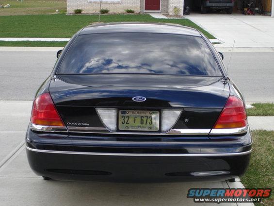 Black 2001 Ford Crown Victoria rear view with Indiana license plate 32 F 673
