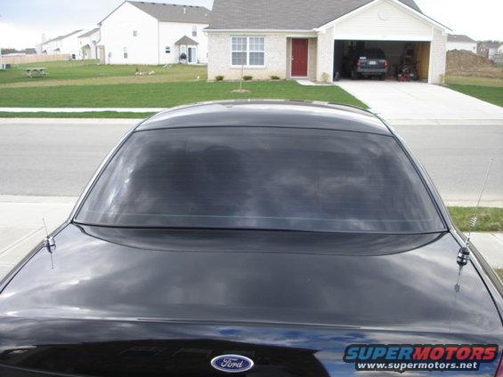 2001 Ford Crown Victoria rear view with tinted windows and Ford emblem