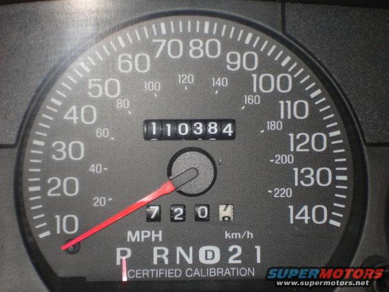 Speedometer with 110,384 miles and 'Certified Calibration' text