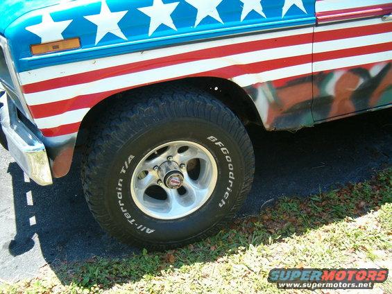 1985 Ford Bronco fender with American flag paint and BFGoodrich All-Terrain T/A tire