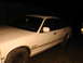 1992 Ford Crown Victoria - Side view of a white 1992 Ford Crown Victoria sedan.