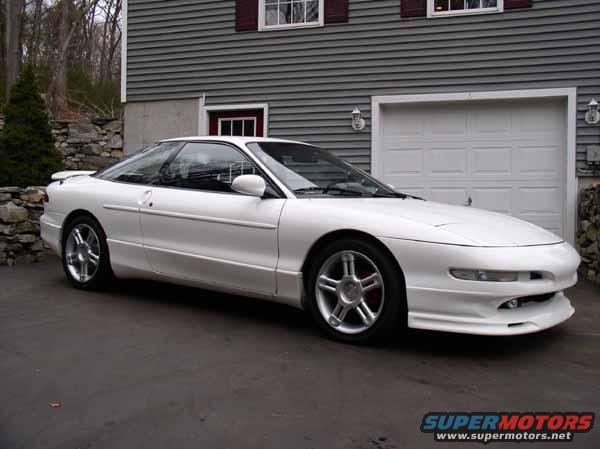 White 1996 Ford Probe GT coupe parked in driveway