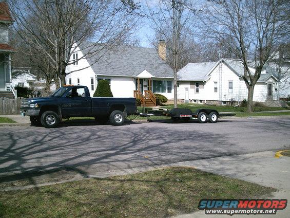 2001 Dodge 2500 pickup truck side view towing a trailer
