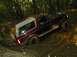 1996 Ford Bronco - This 1996 Ford Bronco is stuck in the mud while off-roading in a wooded area.