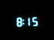 1995 Ford Thunderbird - Digital clock displaying 8:15, likely from a vehicle's dashboard.