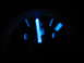 1995 Ford Thunderbird - Close-up of a car's fuel gauge, illuminated in blue, indicating the tank is almost full.