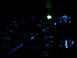 1995 Ford Thunderbird - The illuminated dashboard gauges display the odometer reading of 128,371 and other indicators.