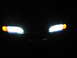 1995 Ford Thunderbird - Front view of a 1995 Ford Thunderbird's illuminated headlights and grille.