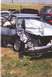 1996 Ford Bronco - This sedan sustained severe front-end damage, likely from a collision.