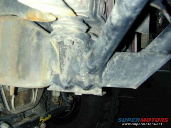 Undercarriage part with Supermotors logo