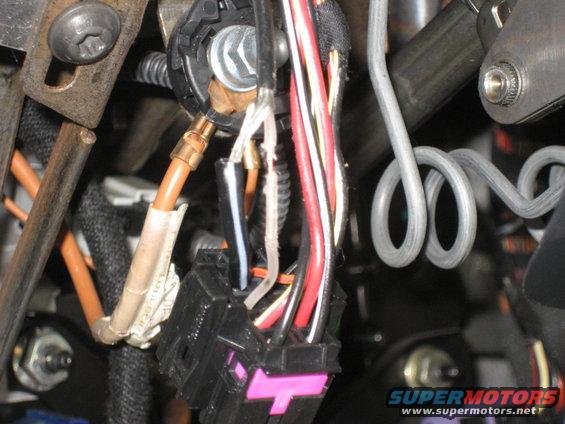 img_3816.jpg I personally dont like cutting factory wires when I can aviod it, especially because the antenna wire had another wire spliced into it from the factory, again just my preferance.  I chose to strip back the sheath and just tap into the wire.