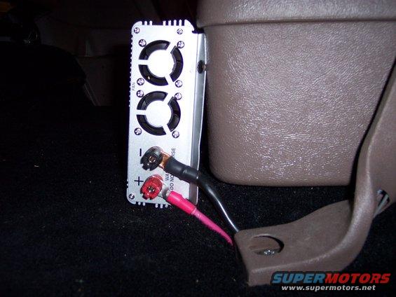 6 ga. power cables grounded to the seat belt anchor bolt