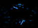 1995 Ford Thunderbird - The dashboard gauges, including fuel and battery indicators, glow blue in the dark.