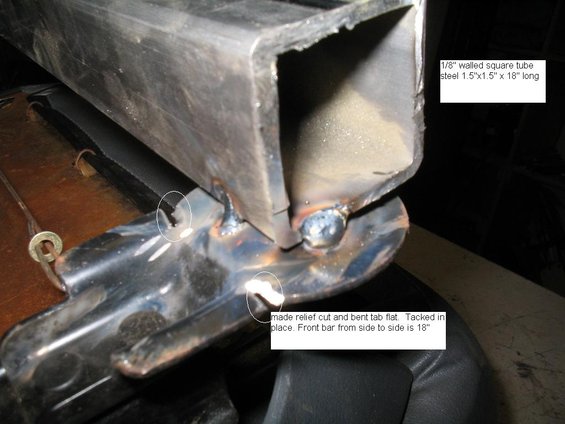 seats-002.jpg the original seat mounting bracket was at an angle, so I made a couple relief cuts and bent it flat.  Welded the .188 wall tubing to it.