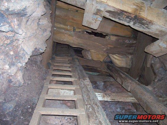 102_0698.jpg ladder going up to another level in the mine.
