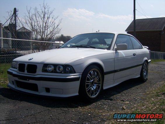 White BMW coupe, 3/4 front view