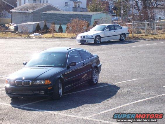 Black BMW coupe, 3q front view. Matches 2001 BMW 3 Series claim