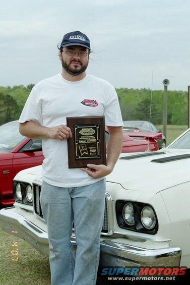 White 1975 Ford Ranchero front end with chrome bumper and dual headlights