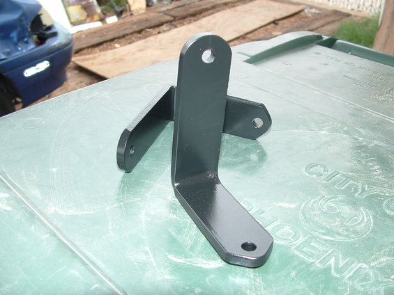 Black metal motorcycle luggage rack bracket with three mounting holes