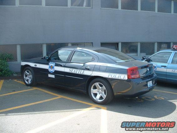 Seattle Police car parked next to another police car