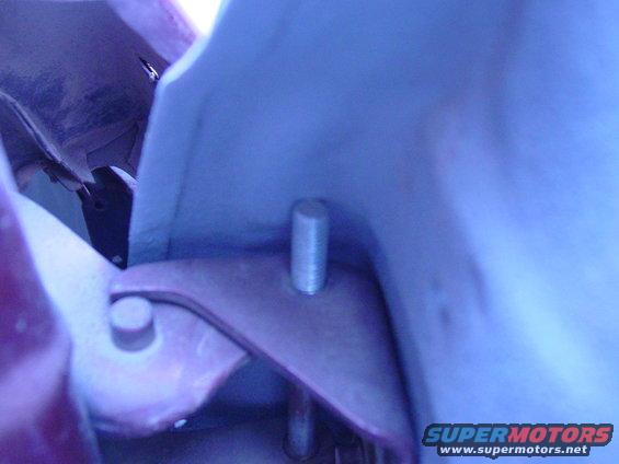 Close-up of a metal bracket with a bolt protruding from it