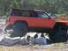 1989 Ford Bronco - An orange SUV navigates a rocky obstacle course on March 18, 2007.