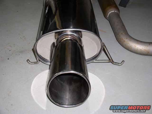 Exhaust muffler with chrome tip and bent pipe section