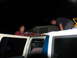 1995 Ford C-350 (Centurion Conversions) - Two men are working on the roof of a van.