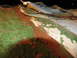 1995 Ford C-350 (Centurion Conversions) - Abstract view of weathered paint and rust, showing layers of color and decay.