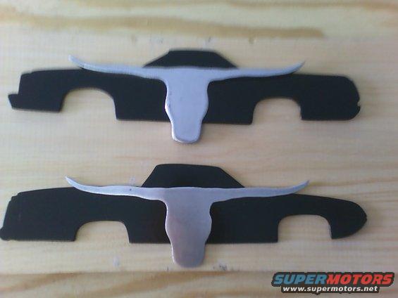 Two black car profile cutouts, each with a silver steer horn emblem