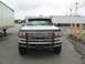 1995 Ford C-350 (Centurion Conversions) - Front view of a white Ford F-Series truck, likely from the early to mid-1990s.