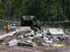 1989 Ford Bronco - An off-road vehicle navigates a challenging obstacle course made of concrete debris.